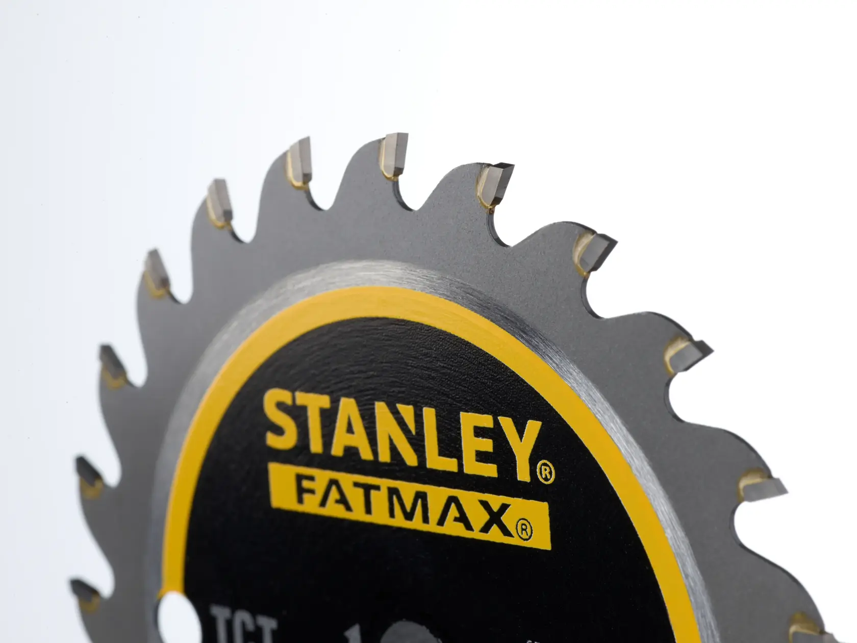 STANLEY STA10410 Kreissägeblatt Nahaufnahme, schwarz-gelbes Design, Seitenansicht.